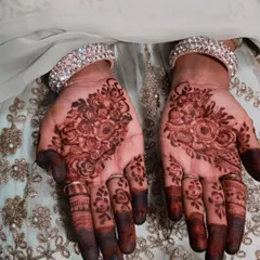 The final stain on my friend's hands. The deep color makes the floral clusters on her palms really stand out.