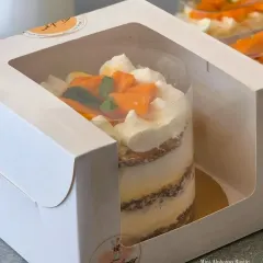Here is my Mini Alphonso Semi-Naked Cake, perfectly packaged for gifting. It's an ideal size for 3-4 people to share and enjoy the taste of fresh mangoes.