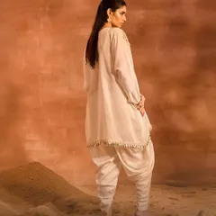 The back of the ORION Kaftan Set, highlighting the clean drape of the kaftan and the modern dhoti pants.