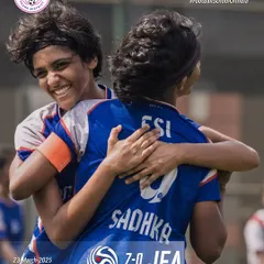 The joy of scoring. Two teammates celebrate a goal during our 7-0 win in the Thane Women's League.