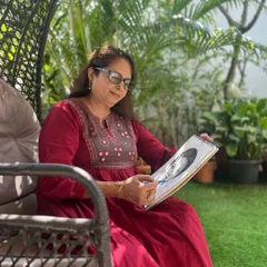 Here I am in my garden, taking a moment for myself with my sketchbook. Art is not just my profession; it's my own therapy and a way of life. Practicing regularly takes me to a meditative state and keeps my own creative spirit alive.