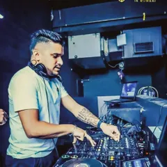 In the booth at Yen, a popular Mumbai nightclub. The setup here is intimate, allowing for a great connection with the audience on the dance floor.