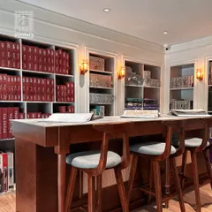 My showroom's consultation area, where clients can browse through my extensive library of fabric and wallpaper books with the help of my design team.
