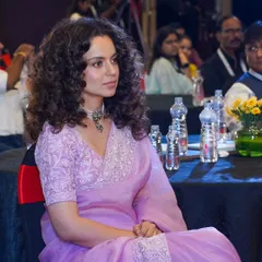 A candid photograph of actress Kangana Ranaut in the audience. I specialize in discreetly capturing high-profile guests and VIPs, ensuring authentic moments are preserved without disrupting the event flow.