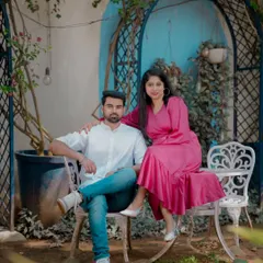 A chic and relaxed portrait in a garden cafe setting. This style is great for a casual and modern "Save the Date" announcement.