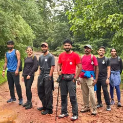 Our trekking team on the muddy trail leading to Dudhsagar falls. Proper trekking gear is a must for this adventurous journey.