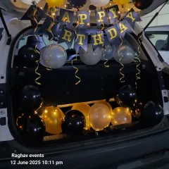 A closer look at the car boot decoration. The combination of balloons and lights creates a magical effect, perfect for a nighttime surprise.