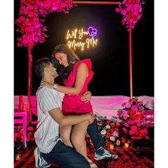 Down on one knee, surrounded by flowers and light. This is the classic, heart-melting proposal shot that every couple dreams of. We make sure to capture the look in your eyes right at that moment.
