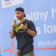 Here I am speaking to the crowd at the Narayana Health Walkathon. Our role includes motivating participants and ensuring everyone is in high spirits.