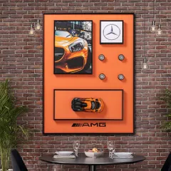 For the ultimate car enthusiast, we created this shadow box celebrating the iconic Mercedes-Benz AMG. It features a detailed miniature car model, the classic logo, and other 3D elements against a vibrant orange background, perfect for an office or study.