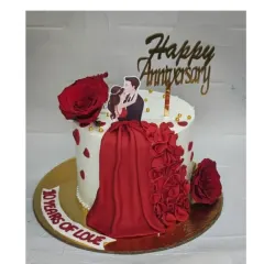 Celebrating a decade of love with this beautiful red dress anniversary cake. It's a fresh pineapple eggless cake, decorated with a flowing fondant gown and fresh roses.