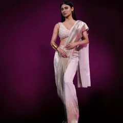 Another look for Mouni Roy in LSD2, this time a stunning metallic saree from 431-88. The styling is modern and ethereal, designed to make her stand out on screen as the show's host.