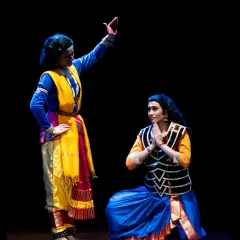 Another powerful moment from the dance drama, showing a scene of reverence and dialogue. This demonstrates my ability to interact with other performers to create a compelling narrative.
