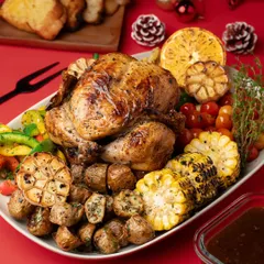 This is what a feast looks like. We styled and shot this entire Christmas spread, from the perfectly roasted chicken and sides to the festive props. This is the kind of high-quality imagery we create for restaurant menus and promotional campaigns.