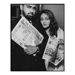 A bold, film noir inspired portrait for their newspaper themed shoot. The direct gaze and dramatic black and white styling create a powerful and memorable image.