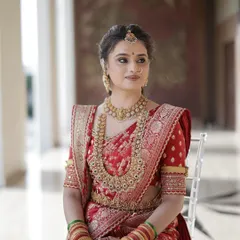 My stunning bride Daneshwari, looking absolutely regal for her muhurtham. She is wearing a beautiful red Sabyasachi saree, and I created a classic look with defined eyes and radiant skin to match.