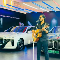 Here I am performing a solo acoustic set for a BMW car launch event. This clean, sophisticated setup is perfect for product launches and brand showcases, creating a cool and classy atmosphere for guests.