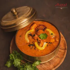 Our Tandoori Chicken Tikka Masala is a crowd-pleaser. Smoky tandoori chicken pieces are simmered in a creamy, flavourful tomato-based gravy. It's the perfect main course for any event.