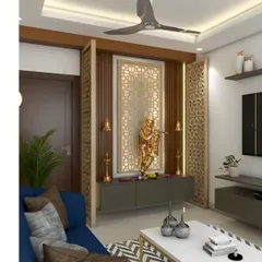 Here, I integrated the pooja area into the living room using decorative jali partitions. This design defines the sacred space while keeping it connected to the rest of the home, featuring a golden Krishna idol as the centerpiece.