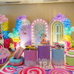 A wider view of the incredible candy land theme for Ira's 8th birthday. Capturing the entire setup shows the scale and effort that went into creating such a magical atmosphere for the kids.