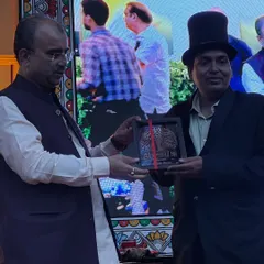 Receiving my award at the Bapu Auditorium in Patna. The event was a super success, and this honor was the perfect end to two days of non-stop magic.