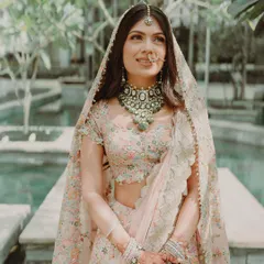 A beautiful portrait of Tanisha for her phera ceremony. Her makeup is soft and subtle, with a gentle focus on the eyes and a natural lip color, letting her stunning Anamika Khanna outfit shine.