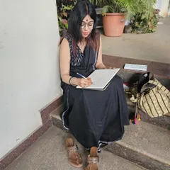 Doing what I love most, sketching. This candid shot was taken by a dear friend during a live sketching session at one of our exhibitions.