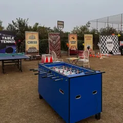 The game night setup included a variety of classic games like table tennis, foosball, chess, and darts to ensure there was something for everyone.