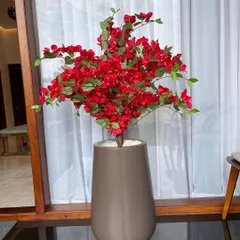 Love the look of flowers but worried about the upkeep? Our artificial plants are the answer. This vibrant bougainvillea brings a pop of colour and looks incredibly real, with zero effort needed.