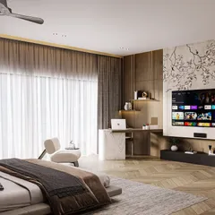 This view of the master suite highlights its functional elegance. A sleek, built-in desk and media unit are seamlessly integrated into the design, featuring the same delicate floral motif seen throughout the room.