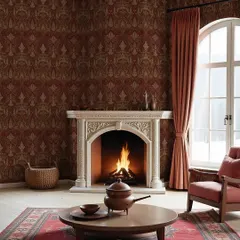Here, the maroon Begum Jaal wallpaper creates a cozy and inviting living room. It shows how a maximalist, heritage pattern can make a space feel both grand and intimate.