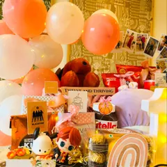 This angle shows the collage of 12 cherished photos we included, celebrating each year of her life. It's a gift curated with a mother's love and an eye for aesthetic details.