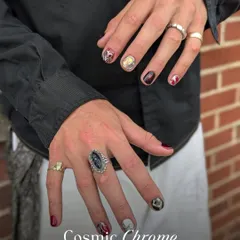 Make a statement with this Cosmic Chrome nail art. This design combines multiple colors and textures with intricate details, showcasing the high level of artistry my nail technicians can achieve for a truly unique look.