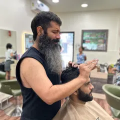 Listening to my client talk about how Arsenal could have won last night. A haircut session is more than just a service, it's a conversation.