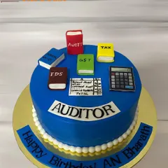 I designed this cake for an auditor, featuring edible books for Tax, GST, and TDS, along with a calculator and a balance sheet. It’s a fun way to celebrate the meticulous work they do.