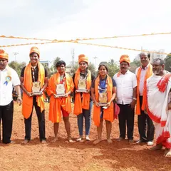A group of female wrestlers being honored at the state-level Kusti tournament. We are proud of all our fighters.