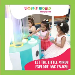 Little minds exploring one of our interactive game stations. These activities are designed to be intuitive and engaging for young children.