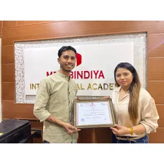 We welcome and train everyone with a passion for makeup. Here, one of our talented male students proudly receives his certification.