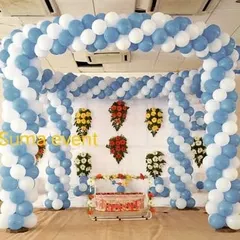 This is a simple yet elegant balloon decoration I did for a naming ceremony. The structure uses blue and white balloon pillars and arches to create a beautiful frame for the baby's cradle.