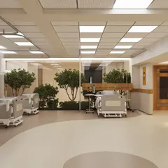 This is our biophilic design philosophy in action within an ICU. We incorporated a central green courtyard, visible through large glass panels, to bring the calming presence of nature directly into the recovery space, reducing patient stress and creating a more hopeful environment.