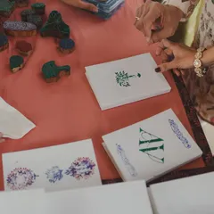 At the 'Artisan's Studio' Mehendi, we set up a block-printing station where guests could create their own custom-stamped notebooks, connecting them to the craft-inspired theme.