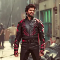 Action styling for Vijay Deverakonda's Thums Up campaign. We designed this custom black and red leather biker suit to create a powerful, heroic silhouette that stands out in high-energy sequences.