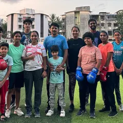 Our team of boxers, featuring fighters of all ages from young children to teenagers. We create a welcoming environment where everyone can train and grow together.