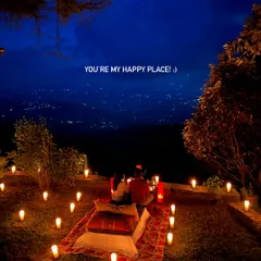 Let's create your happy place. This shot shows a beautifully styled, romantic candlelit picnic with a stunning view, perfect for an anniversary, a special date, or a pre-wedding shoot.