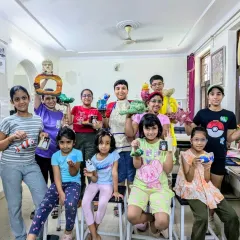 Another happy group with their finished papermache projects. It's wonderful to see the pride on their faces as they show off their unique 3D creations.
