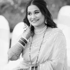 A classic black and white portrait of the reception bride, highlighting her features and the timeless elegance of the look.