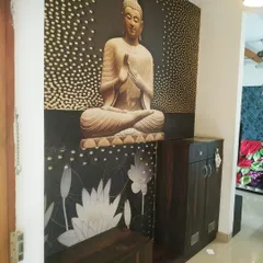 A serene, custom-designed Buddha mural installed in an entryway. This type of spiritual wallpaper adds a sense of peace and personalization to your home.