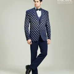 This navy blue three-piece tuxedo features a distinct star pattern, offering a contemporary twist on formal wear. It’s designed for the man who appreciates classic style but isn’t afraid to stand out.