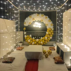 A wide shot of the fairy light cabana on a terrace, creating a perfect ambiance for a night party.