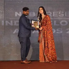 Another proud moment, receiving an award from actress Mouni Roy. I am grateful for these opportunities.